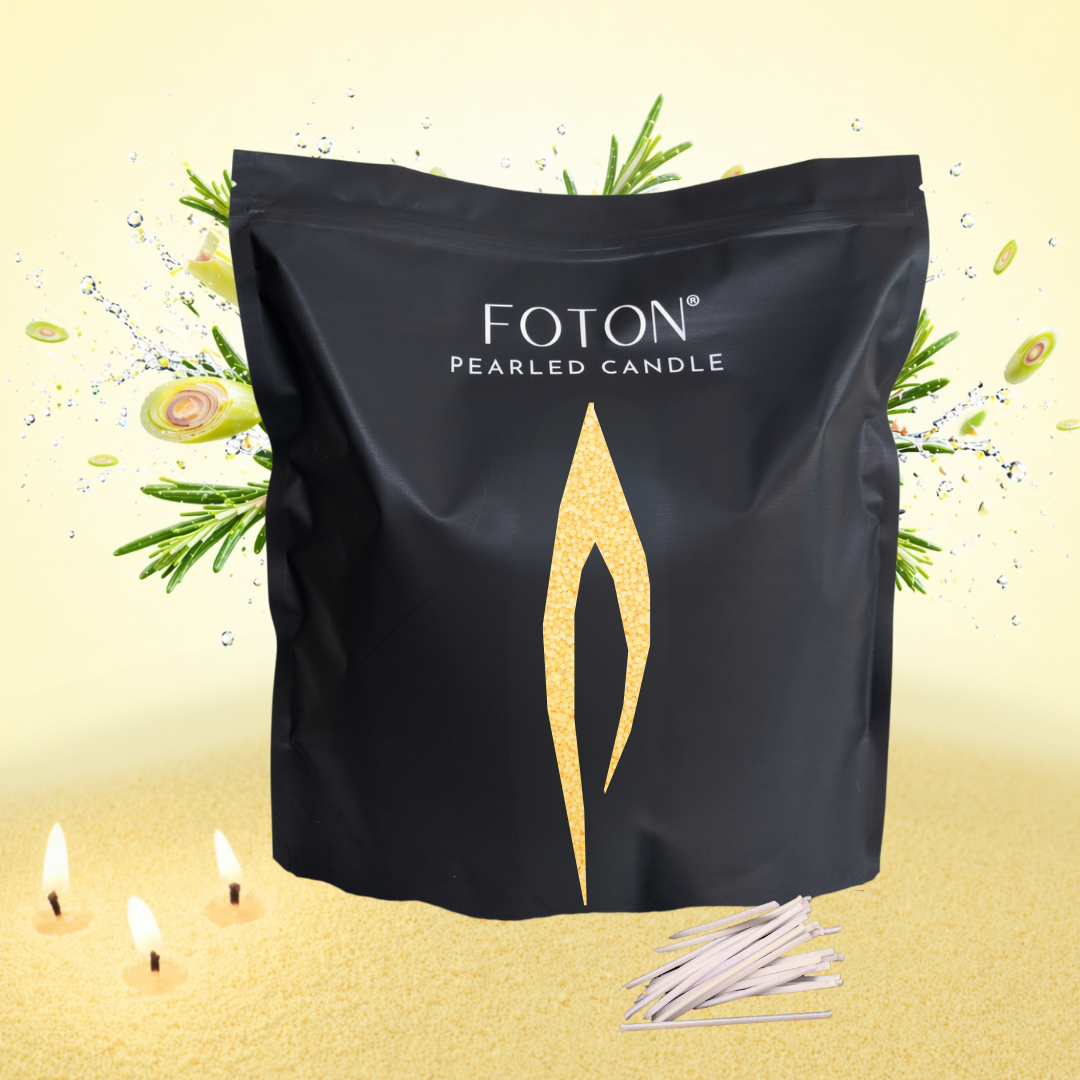 A vibrant, scent-forward product image showcasing the 64oz Foton pearled candle packaging against a fresh, citrus-inspired backdrop. Bursting with botanical elements and dynamic splashes, the scene highlights the fragrance profile while the glowing wicks and textured wax ground the product in warmth and sensory appeal.