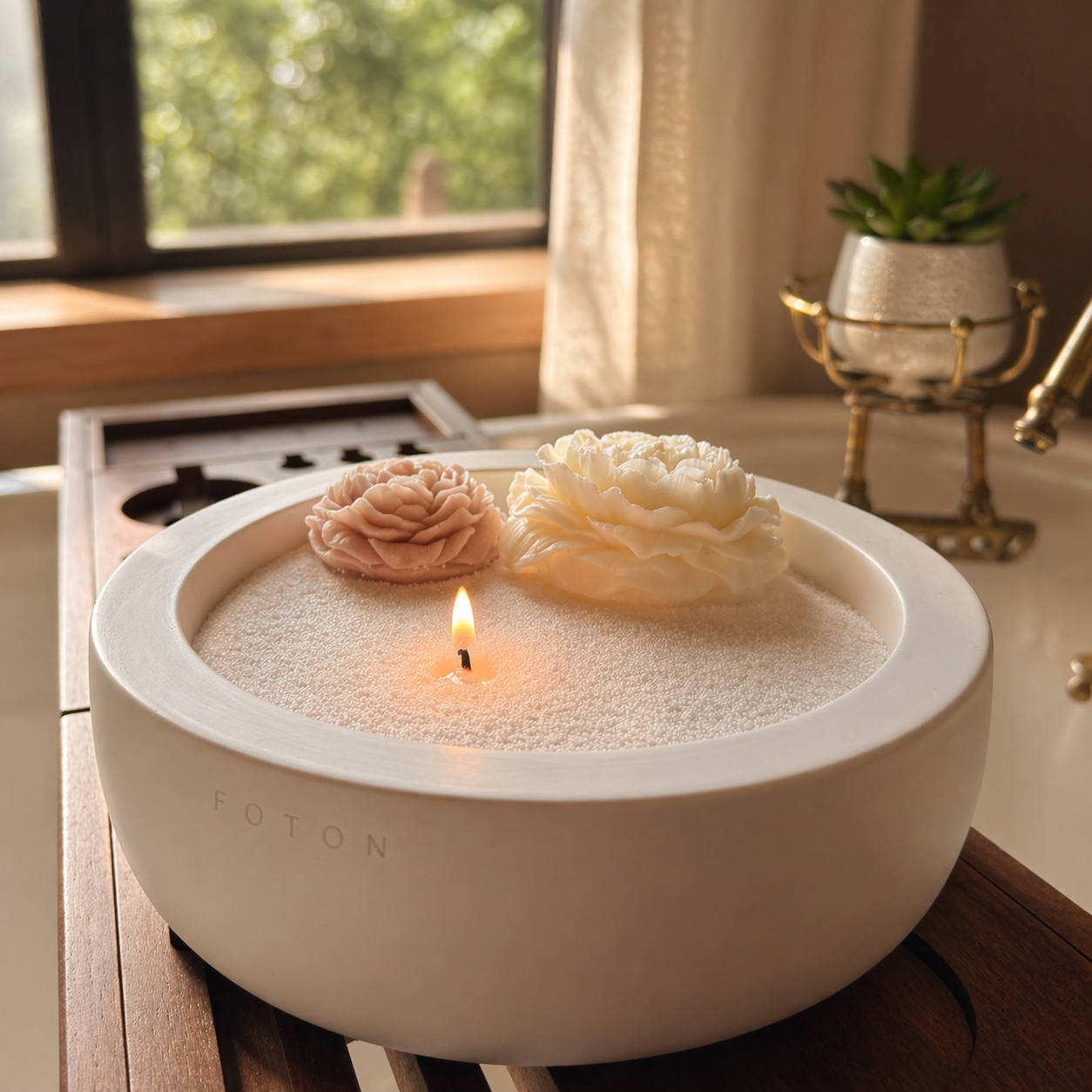 A serene, spa-inspired lifestyle scene featuring a pearled candle in a smooth, modern Luxe vessel, softly glowing beside delicate wax floral accents. Bathed in natural light, the setting evokes calm and relaxation, highlighting the candle’s clean aesthetic and its ability to elevate everyday moments into a soothing ritual.