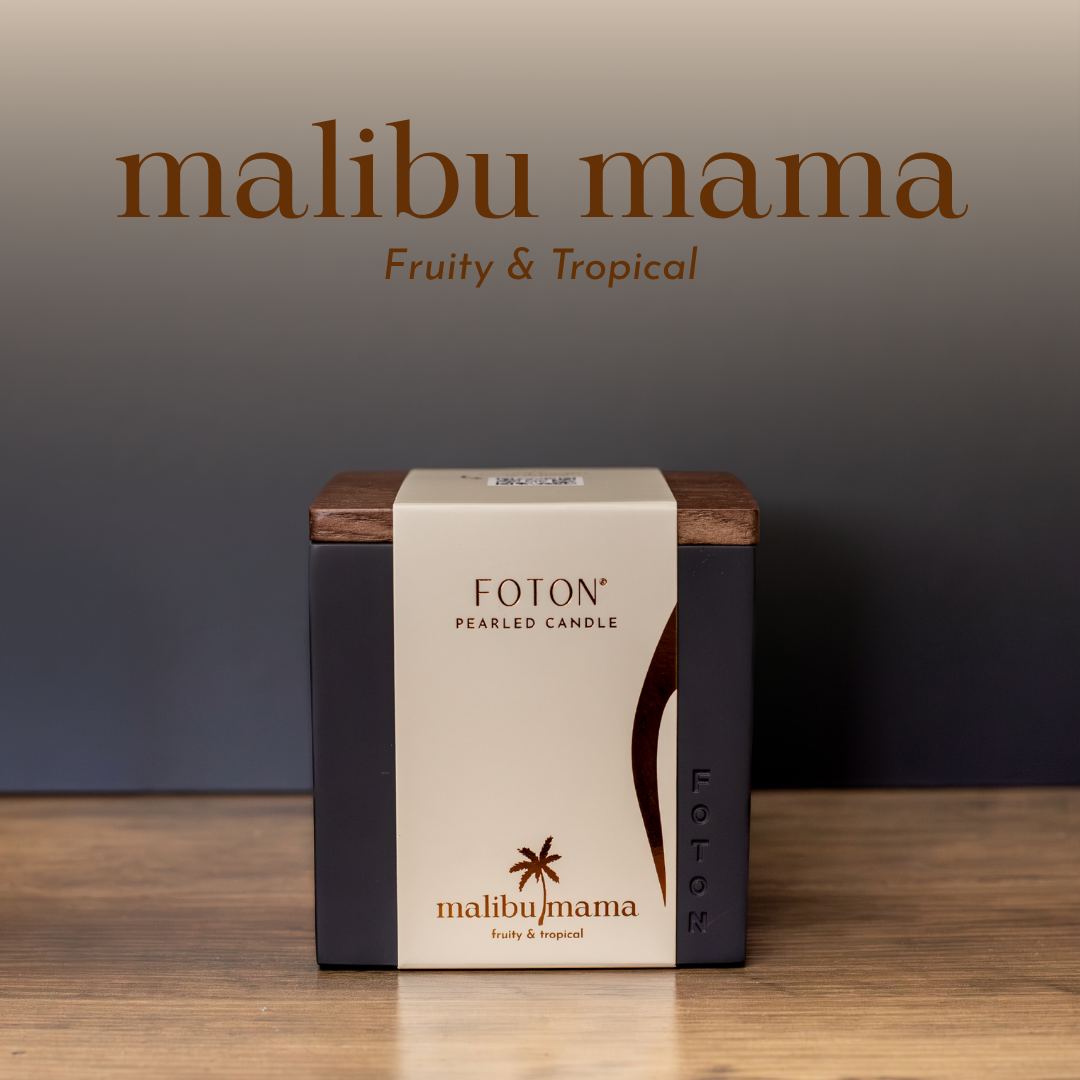 Product image of the Malibu Mama candle in the Le Cube vessel, displayed in clean, warm-toned packaging that highlights its fruity, tropical scent profile.