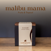 Product image of the Malibu Mama candle in the Le Cube vessel, displayed in clean, warm-toned packaging that highlights its fruity, tropical scent profile.