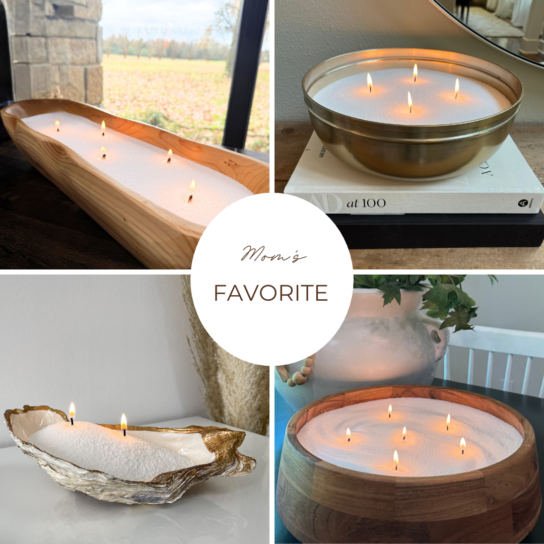 Collage of four decorative pearled wax candles labeled “Mom’s Favorite” in the center. Top left shows a long wooden tray candle with multiple lit wicks near a window view. Top right features a round metal bowl candle with four flames on stacked books. Bottom left displays a shell-shaped vessel candle with two flames. Bottom right shows a round wooden bowl candle with several lit wicks beside a plant.
